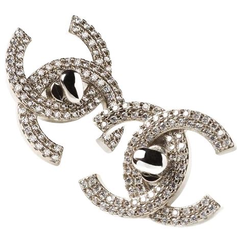 chanel earrings spelling chanel|Chanel turnlock earrings.